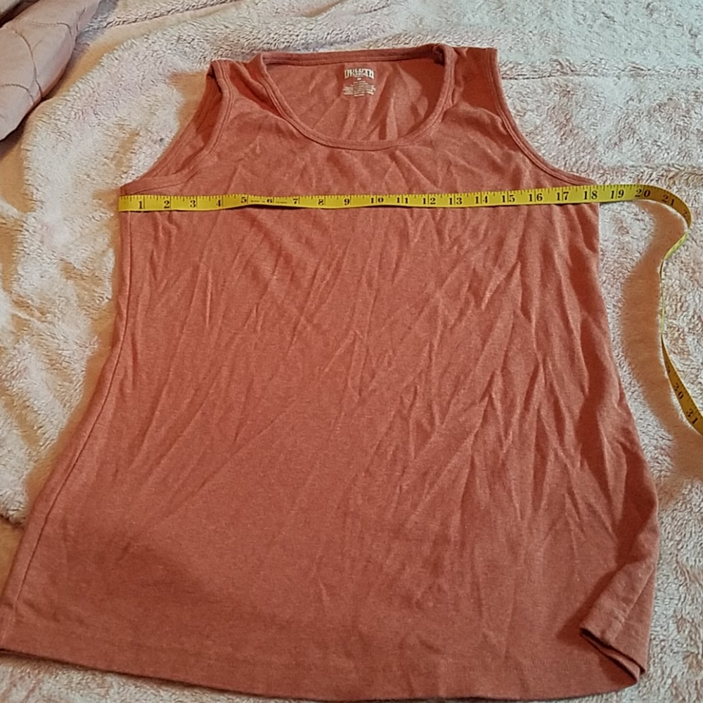 Duluth tank. Sz medium. Color: soft orange/ peach